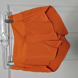 Small orange outdoor voices shorts